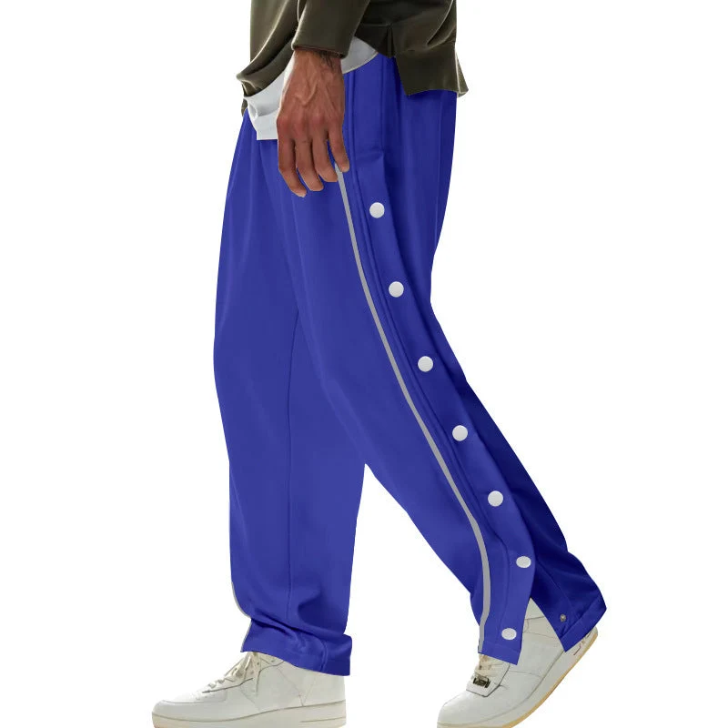 Herren nan weite Trackpants mit seitlicher Druckknopfleiste, elastischem Bund und reflektierendem Streamline-Streifen Drune