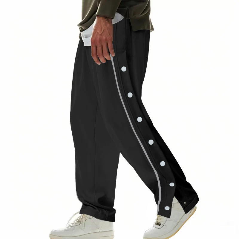 Herren nan weite Trackpants mit seitlicher Druckknopfleiste, elastischem Bund und reflektierendem Streamline-Streifen Drune